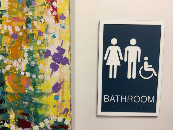 Bathroom ADA Sign installed by Envision Orlando