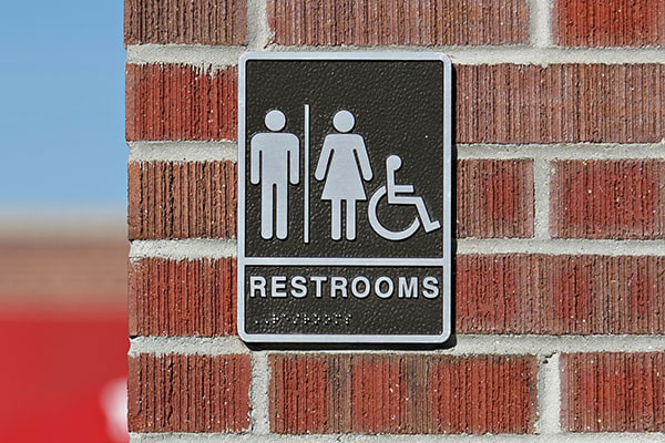 Custom ADA restroom signs made by Envision Orlando