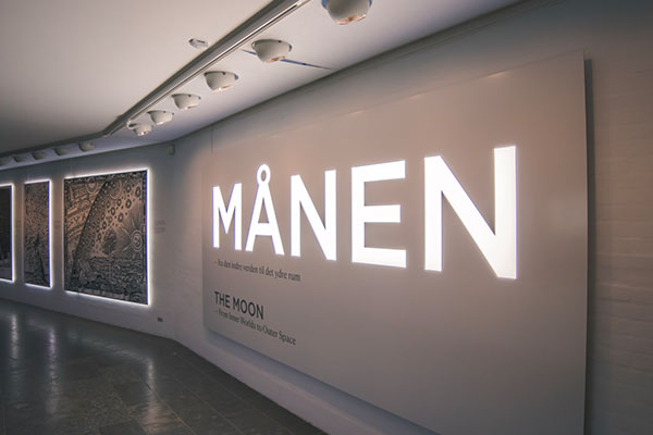 Lighted lobby sign of MAMEN installed by Envision Orlando