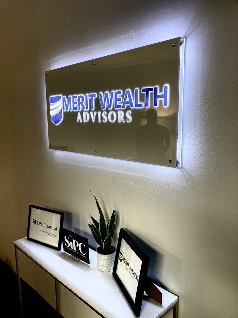 lighted metal signs of Merit Wealth business in Orlando, FL