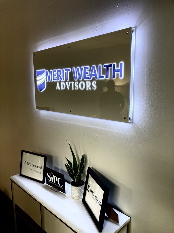Commercial lighted sign for Merit Wealth fabricated by Envision Orlando