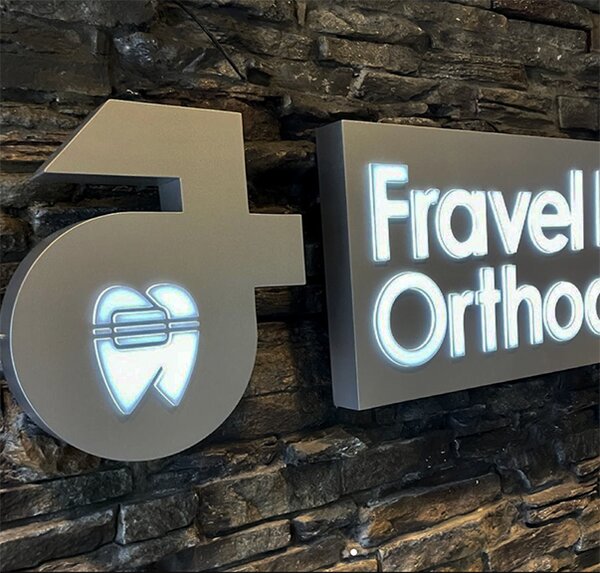 Lighted metal signs of Fravel made by Envision Orlando