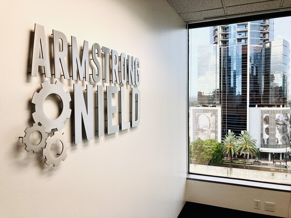 Metal lobby sign of Armstrong made by Envision Orlando