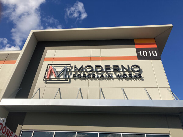 Storefront channer letters for Moderno building made by Envision Orlando