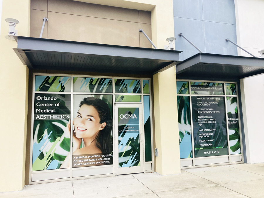 Storefront Window Graphics Of Ocma Installed By Envision Orlando